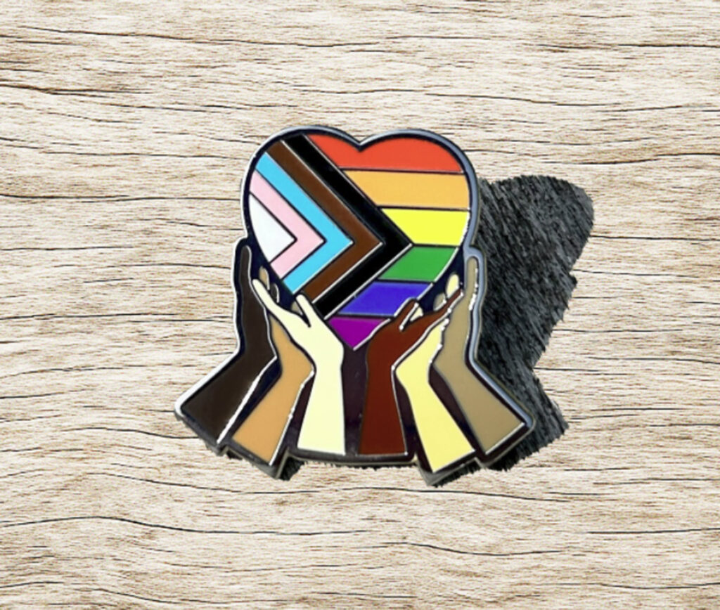 Support hands and heart progress pride pin