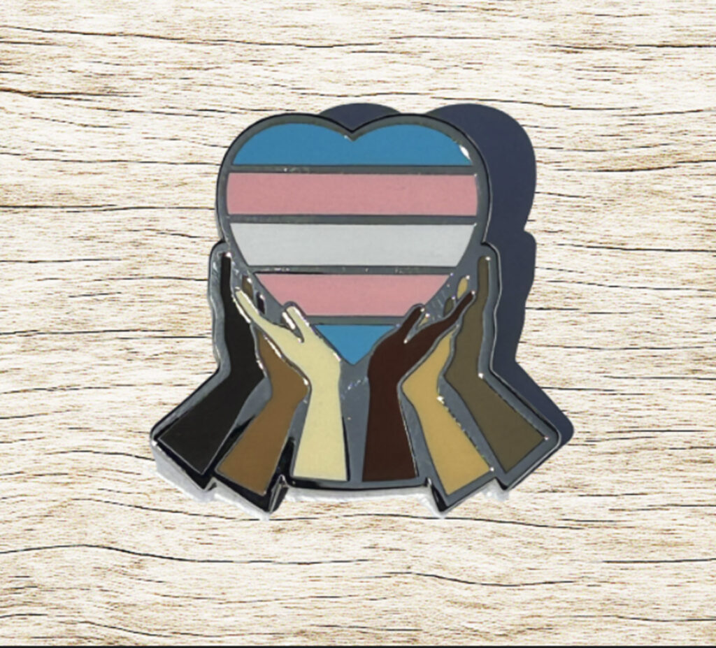 Support hands and heart trans pride pin